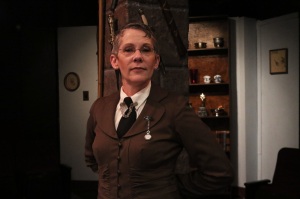 Suzanne Hoxsey as Inspector Harriet Goring. Credit: Spotlighters Theatre/Shealyn Jae Photography/shealynjaephotography.com